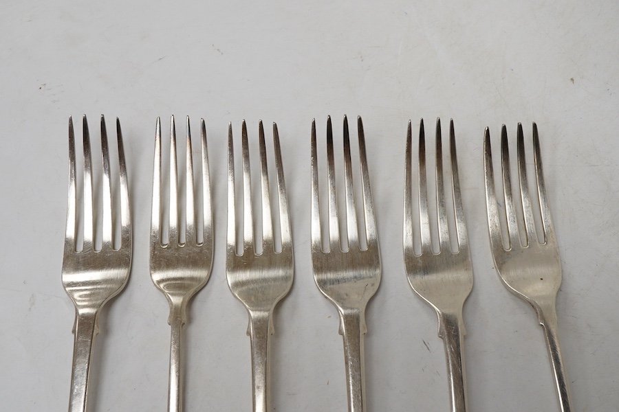 Six George III and early Victorian matched fiddle pattern table forks, of which four London, 1838, Samuel Hayne & Dudley Cater, 20cm, crested, 13.8oz.